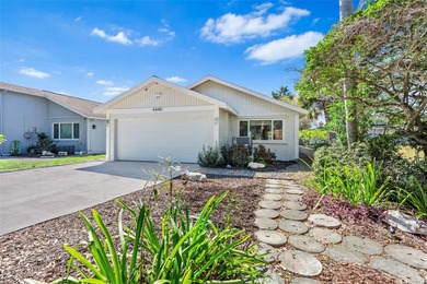 Welcome to 4448 Marine Parkway - Your Waterfront Dream Home on Gulf Harbors Golf Course in Florida - for sale on GolfHomes.com, golf home, golf lot