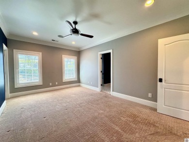 Located in the Grove Subdivision on a 1.72-acre lot, this on Country Club of Paducah in Kentucky - for sale on GolfHomes.com, golf home, golf lot