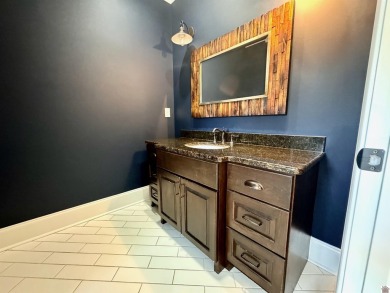 Located in the Grove Subdivision on a 1.72-acre lot, this on Country Club of Paducah in Kentucky - for sale on GolfHomes.com, golf home, golf lot