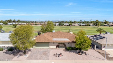 The Brick Driveway Welcomes You To An Enclosed Courtyard on Sun City Lakes West and East in Arizona - for sale on GolfHomes.com, golf home, golf lot