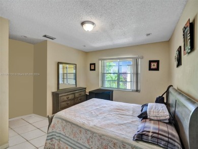 Welcome to your dream condo in the sought-after community of on Woodmont Country Club in Florida - for sale on GolfHomes.com, golf home, golf lot