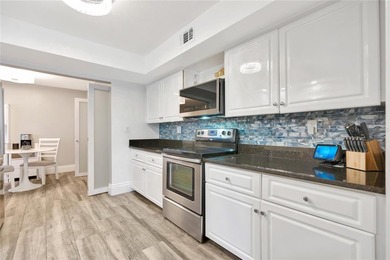 Fully renovated 3BD/2BA two-story condo featuring designer-style on Boca Pointe Country Club in Florida - for sale on GolfHomes.com, golf home, golf lot