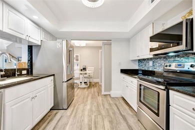 Fully renovated 3BD/2BA two-story condo featuring designer-style on Boca Pointe Country Club in Florida - for sale on GolfHomes.com, golf home, golf lot