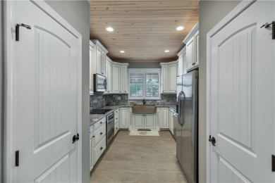 LAKE KEOWEE VIEWS from this beautifully updated Tall Ship Condo on Keowee Key Golf and Country Club in South Carolina - for sale on GolfHomes.com, golf home, golf lot