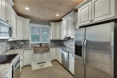 LAKE KEOWEE VIEWS from this beautifully updated Tall Ship Condo on Keowee Key Golf and Country Club in South Carolina - for sale on GolfHomes.com, golf home, golf lot
