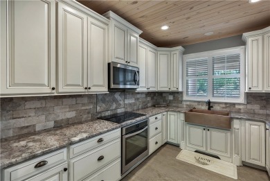 LAKE KEOWEE VIEWS from this beautifully updated Tall Ship Condo on Keowee Key Golf and Country Club in South Carolina - for sale on GolfHomes.com, golf home, golf lot
