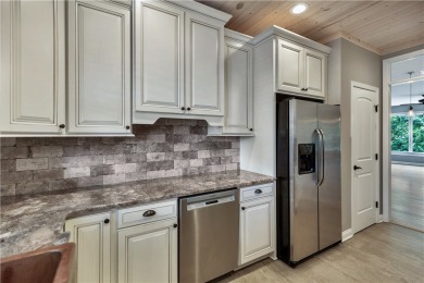 LAKE KEOWEE VIEWS from this beautifully updated Tall Ship Condo on Keowee Key Golf and Country Club in South Carolina - for sale on GolfHomes.com, golf home, golf lot