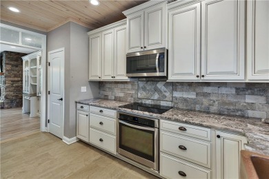LAKE KEOWEE VIEWS from this beautifully updated Tall Ship Condo on Keowee Key Golf and Country Club in South Carolina - for sale on GolfHomes.com, golf home, golf lot