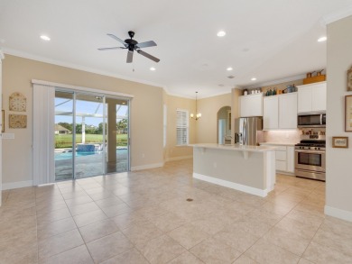 This home has everything a Pointe West buyer wants! Heated & on The Club At Pointe West in Florida - for sale on GolfHomes.com, golf home, golf lot