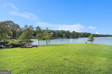 Welcome to your dream lakefront retreat! Nestled in the highly on Fairfield Plantation Golf and Country Club in Georgia - for sale on GolfHomes.com, golf home, golf lot