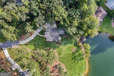 Welcome to your dream lakefront retreat! Nestled in the highly on Fairfield Plantation Golf and Country Club in Georgia - for sale on GolfHomes.com, golf home, golf lot