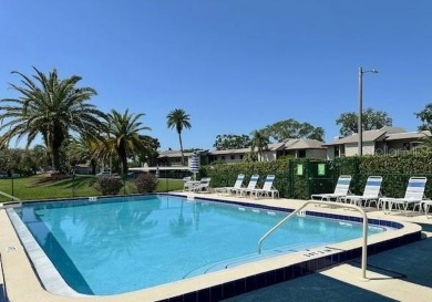 STUNNING!  This renovated condo is simply stunning!  Located in on East Lake Woodlands Country Club in Florida - for sale on GolfHomes.com, golf home, golf lot