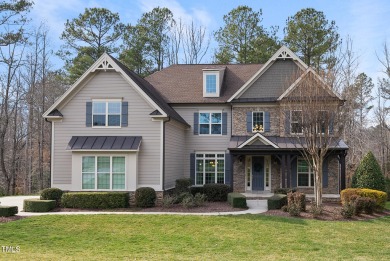 Experience opulent living at its finest in this custom luxury on Hasentree Club in North Carolina - for sale on GolfHomes.com, golf home, golf lot