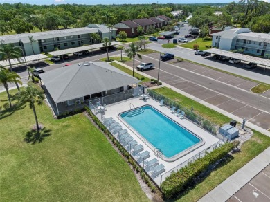STUNNING!  This renovated condo is simply stunning!  Located in on East Lake Woodlands Country Club in Florida - for sale on GolfHomes.com, golf home, golf lot