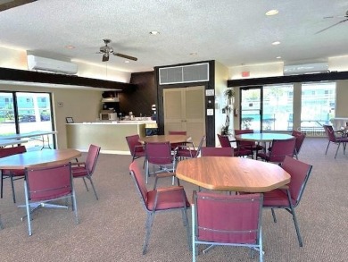 STUNNING!  This renovated condo is simply stunning!  Located in on East Lake Woodlands Country Club in Florida - for sale on GolfHomes.com, golf home, golf lot
