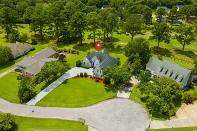 Nestled within a prestigious golf community, this immaculate on Wedgefield Plantation Golf Club in South Carolina - for sale on GolfHomes.com, golf home, golf lot