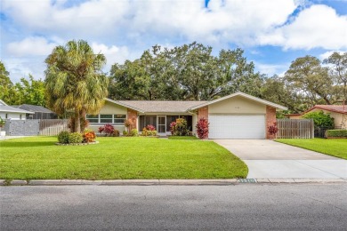 Put this at the top of your list to tour! Inventory remains on The Dunedin Country Club in Florida - for sale on GolfHomes.com, golf home, golf lot