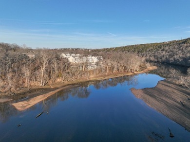 Discover this 2BR/2BA, Turn-key Walk-in Condo nestled within the on Pointe Royale Village Country Club in Missouri - for sale on GolfHomes.com, golf home, golf lot