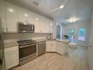 Beautifully updated end-unit townhome in a wonderful north Plano on Ridgeview Ranch Golf Club in Texas - for sale on GolfHomes.com, golf home, golf lot