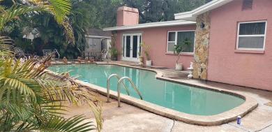 Family Estate home with over 2,000 s/f of living space on Bayou Golf Club in Florida - for sale on GolfHomes.com, golf home, golf lot