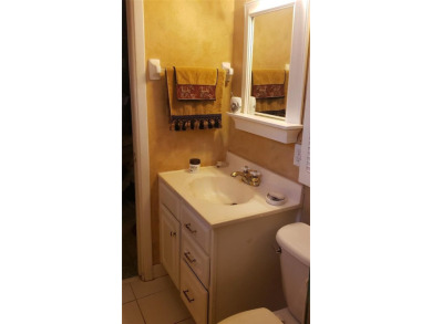 Family Estate home with over 2,000 s/f of living space on Bayou Golf Club in Florida - for sale on GolfHomes.com, golf home, golf lot