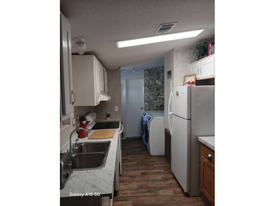 Come and check out your new home located in the gated golf on Hamptons Golf Club in Florida - for sale on GolfHomes.com, golf home, golf lot