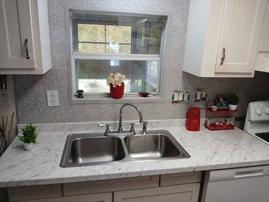 Come and check out your new home located in the gated golf on Hamptons Golf Club in Florida - for sale on GolfHomes.com, golf home, golf lot