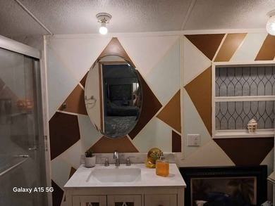 Come and check out your new home located in the gated golf on Hamptons Golf Club in Florida - for sale on GolfHomes.com, golf home, golf lot