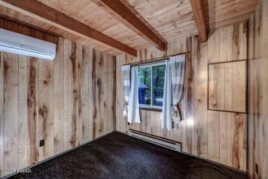 Located on a corner lot in the amenity filled four season on The Hideout Golf in Pennsylvania - for sale on GolfHomes.com, golf home, golf lot