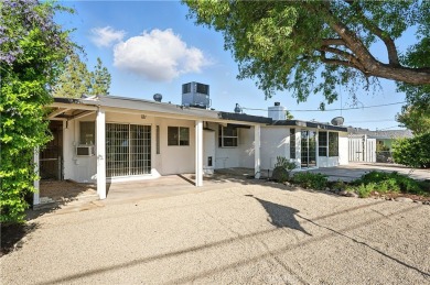 Completely remodeled 55+ home with new flooring, cabinets on Cherry Hills Golf Club in California - for sale on GolfHomes.com, golf home, golf lot