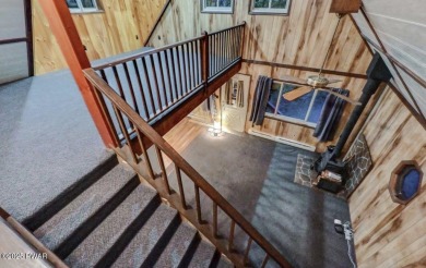 Located on a corner lot in the amenity filled four season on The Hideout Golf in Pennsylvania - for sale on GolfHomes.com, golf home, golf lot
