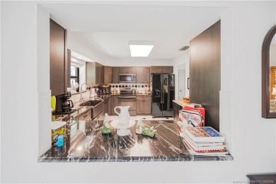 This 2/2/2 single family home situated on the beautiful Martin on Martin Downs Country Club in Florida - for sale on GolfHomes.com, golf home, golf lot