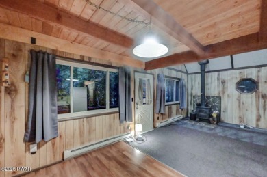 Located on a corner lot in the amenity filled four season on The Hideout Golf in Pennsylvania - for sale on GolfHomes.com, golf home, golf lot