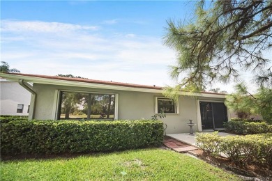 This 2/2/2 single family home situated on the beautiful Martin on Martin Downs Country Club in Florida - for sale on GolfHomes.com, golf home, golf lot