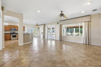 Serenity awaits in this inviting Madeira model, perfectly on Eagle Ridge At Spruce Creek Country Club in Florida - for sale on GolfHomes.com, golf home, golf lot