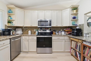 MUST SEE VILLA! SO MANY UPGRADES! RELAX, UNWIND, AND ENJOY THE on On Top of the World Golf Course in Florida - for sale on GolfHomes.com, golf home, golf lot