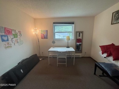 This 3 bed, 3 bath contemporary home is located less than a mile on The Hideout Golf in Pennsylvania - for sale on GolfHomes.com, golf home, golf lot