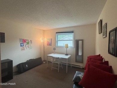 This 3 bed, 3 bath contemporary home is located less than a mile on The Hideout Golf in Pennsylvania - for sale on GolfHomes.com, golf home, golf lot