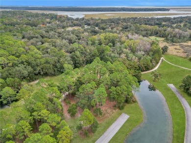 JUST IN TIME FOR SUMMER....0.47 OF AN ACRE IS WAITING FOR YOU TO on Sapelo Hammock Golf Club in Georgia - for sale on GolfHomes.com, golf home, golf lot