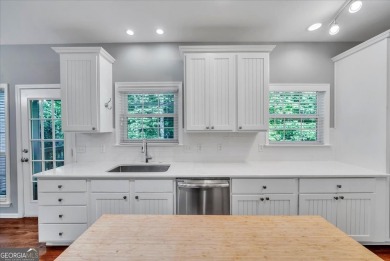 Welcome to this beautifully updated home nestled in the highly on Summergrove Golf Club in Georgia - for sale on GolfHomes.com, golf home, golf lot