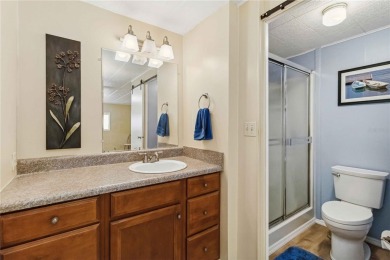 Welcome to this beautifully decorated and impeccably maintained on Twin Isles Country Club in Florida - for sale on GolfHomes.com, golf home, golf lot