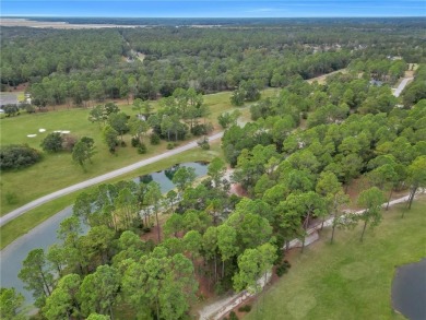 JUST IN TIME FOR SUMMER....0.47 OF AN ACRE IS WAITING FOR YOU TO on Sapelo Hammock Golf Club in Georgia - for sale on GolfHomes.com, golf home, golf lot