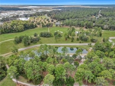 JUST IN TIME FOR SUMMER....0.47 OF AN ACRE IS WAITING FOR YOU TO on Sapelo Hammock Golf Club in Georgia - for sale on GolfHomes.com, golf home, golf lot