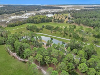 JUST IN TIME FOR SUMMER....0.47 OF AN ACRE IS WAITING FOR YOU TO on Sapelo Hammock Golf Club in Georgia - for sale on GolfHomes.com, golf home, golf lot