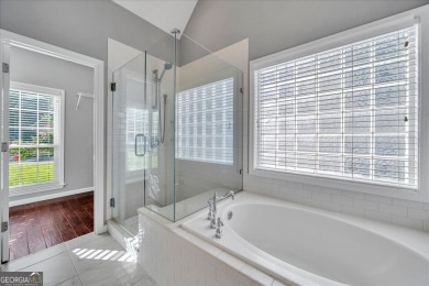 Welcome to this beautifully updated home nestled in the highly on Summergrove Golf Club in Georgia - for sale on GolfHomes.com, golf home, golf lot