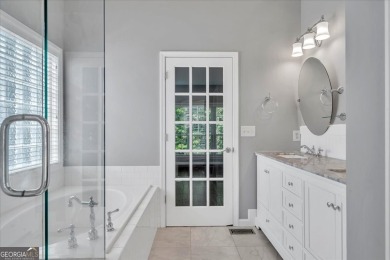 Welcome to this beautifully updated home nestled in the highly on Summergrove Golf Club in Georgia - for sale on GolfHomes.com, golf home, golf lot