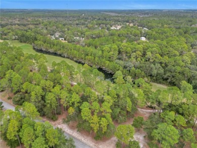 JUST IN TIME FOR SUMMER....0.47 OF AN ACRE IS WAITING FOR YOU TO on Sapelo Hammock Golf Club in Georgia - for sale on GolfHomes.com, golf home, golf lot