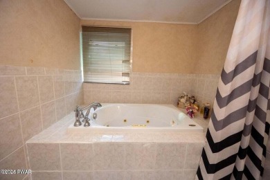 This 3 bed, 3 bath contemporary home is located less than a mile on The Hideout Golf in Pennsylvania - for sale on GolfHomes.com, golf home, golf lot