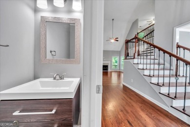 Welcome to this beautifully updated home nestled in the highly on Summergrove Golf Club in Georgia - for sale on GolfHomes.com, golf home, golf lot