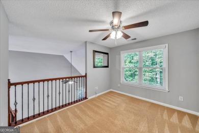Welcome to this beautifully updated home nestled in the highly on Summergrove Golf Club in Georgia - for sale on GolfHomes.com, golf home, golf lot